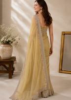 Golden Champagne Tissue Organza Saree With Heavy Embroidered Scalloped Border & Floral Sequin Detailing