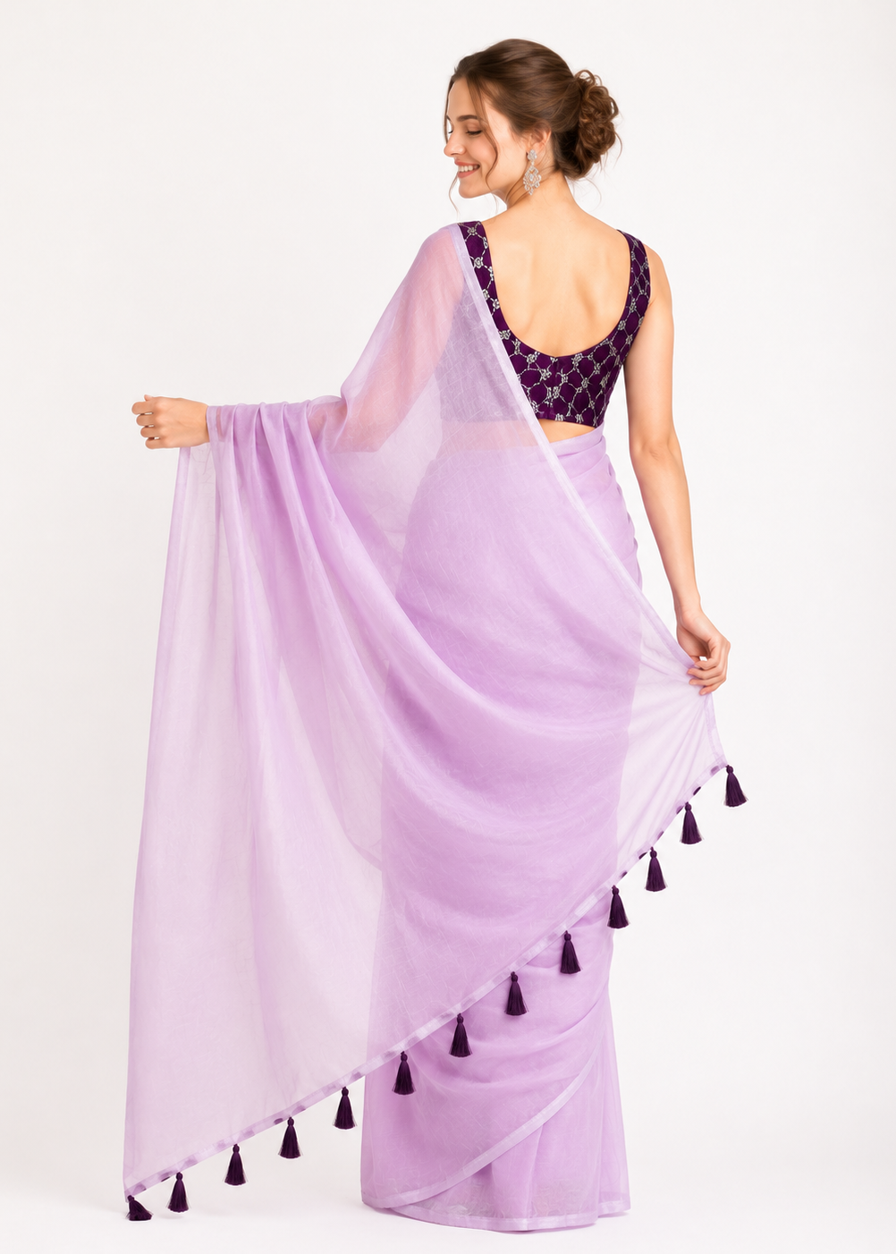 Designer Tissue Silk Saree with Plum Purple Embroidered Blouse & Tassel Pallu