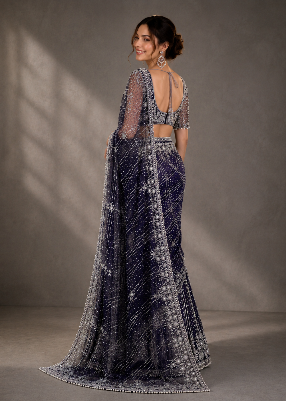 Navy Blue Silver Zari, Stone, Sequin & Pearl Embroidered Soft Net Saree with Heavy Designer Blouse