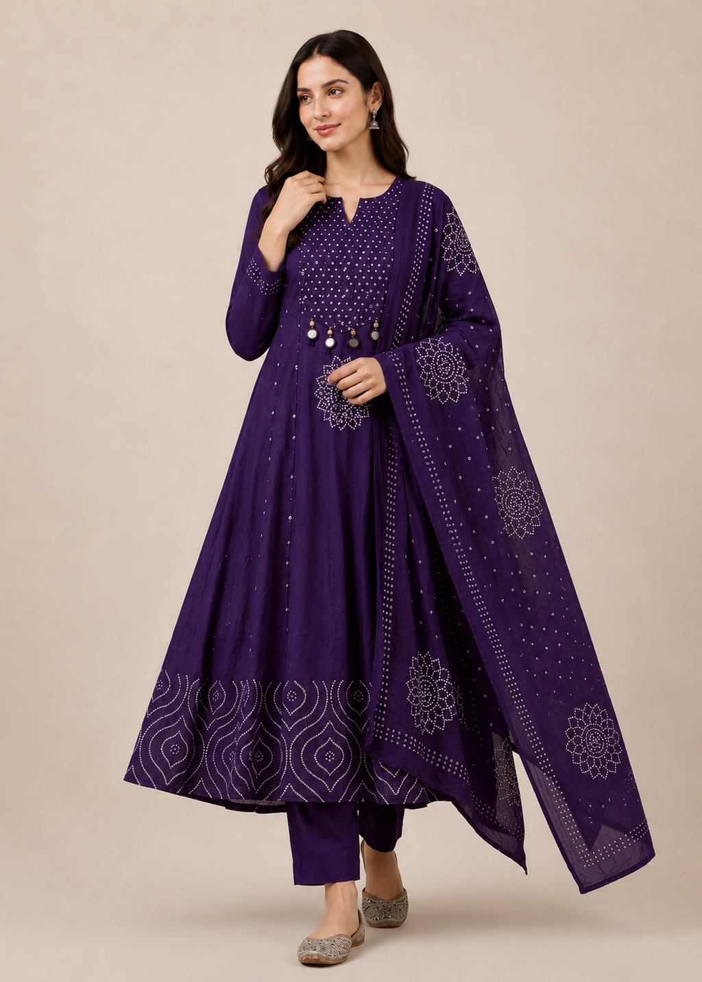 Woman wearing a purple embroidered outfit on a beige background