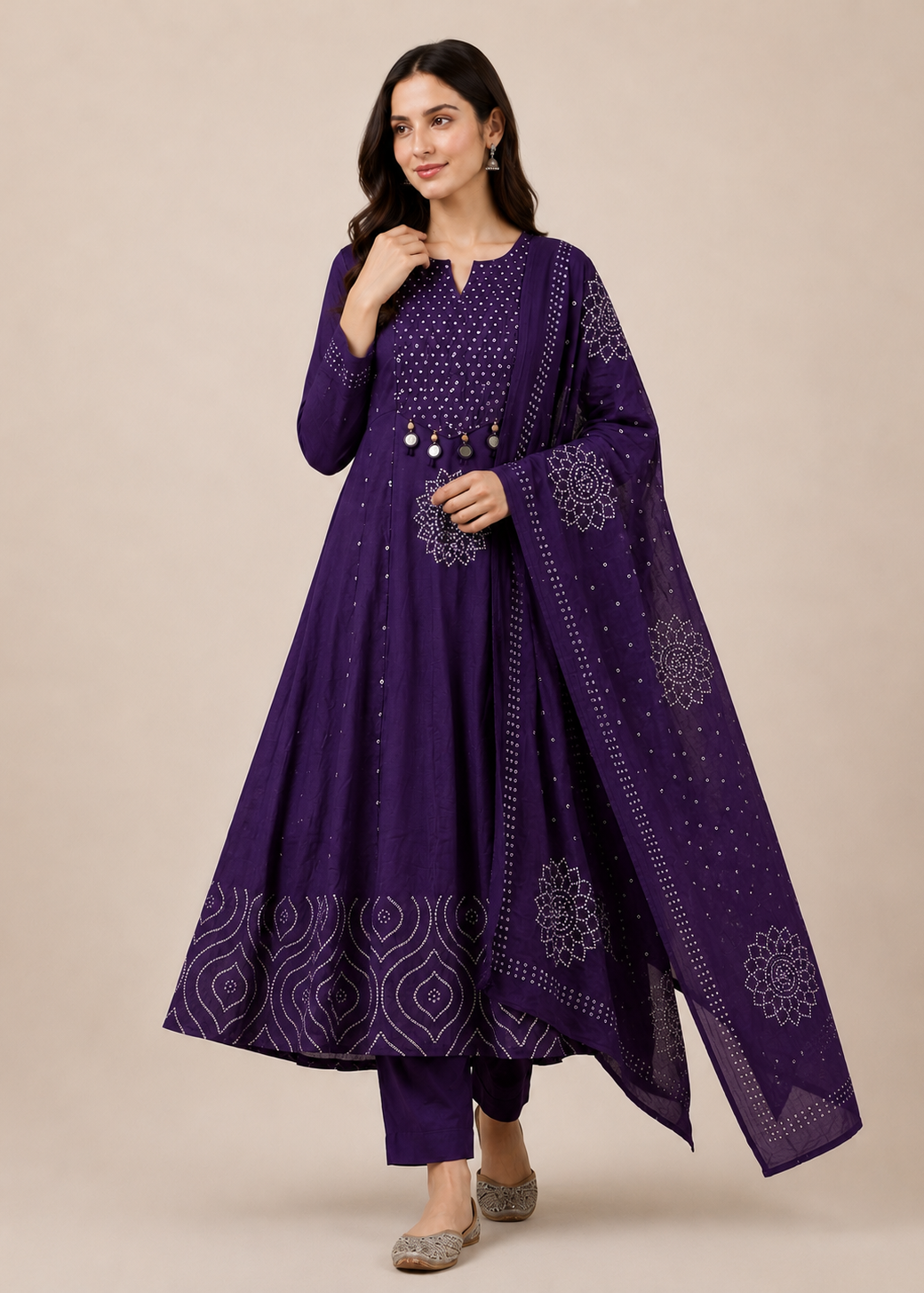 Woman wearing a purple embroidered outfit on a beige background