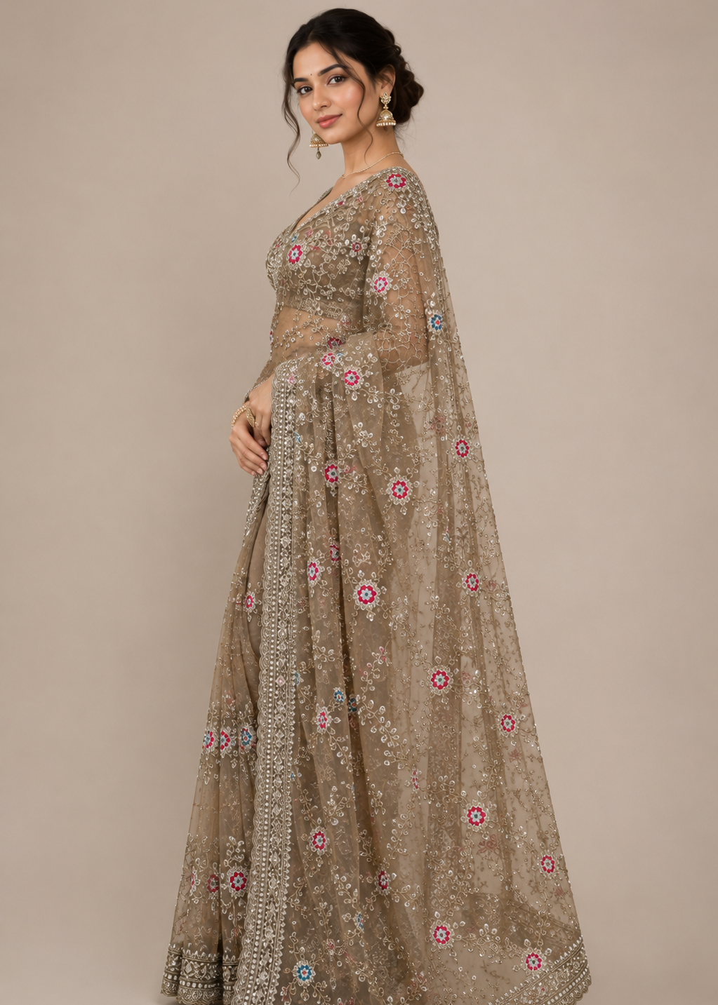 Champagne Blossom Embellished Net Saree with Designer Stitched Blouse