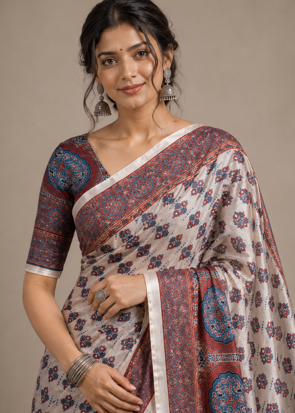 Premium Modal Silk Ajrakh Print Saree with Mirror Work & Tassel Pallu