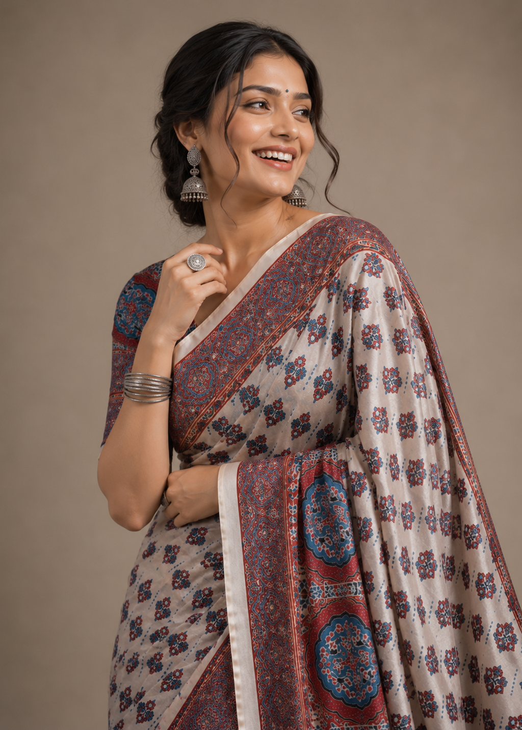 Premium Modal Silk Ajrakh Print Saree with Mirror Work & Tassel Pallu
