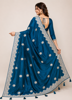 Teal Blue Satin Georgette Saree with Allover Embroidered Weaving Jari Butta & Floral Border