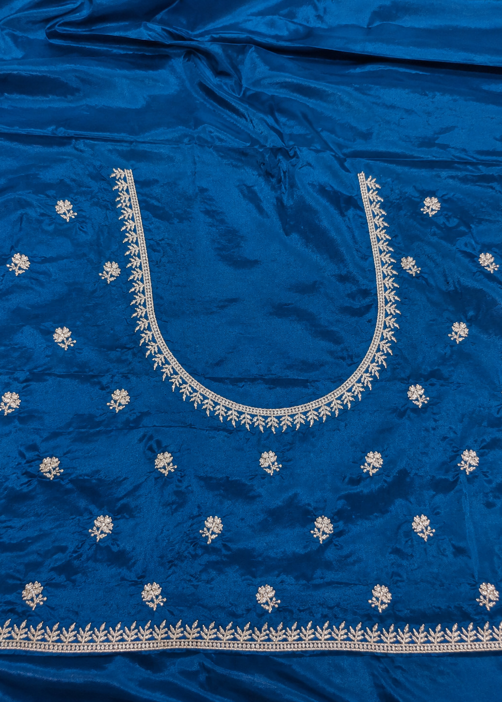 Teal Blue Satin Georgette Saree with Allover Embroidered Weaving Jari Butta & Floral Border
