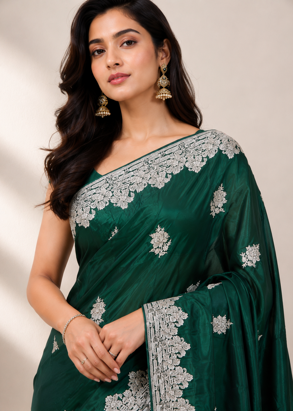 Emerald Green Satin Georgette Saree with Allover Embroidered Weaving Jari Butta & Floral Border