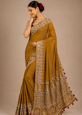 Mustard Ajrakh Printed Modal Saree With Real Mirror Work & Larkan Detailing