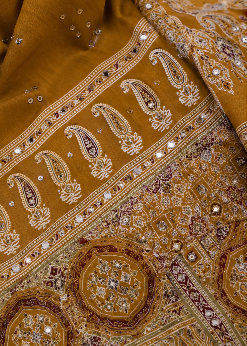 Mustard Ajrakh Printed Modal Saree With Real Mirror Work & Larkan Detailing